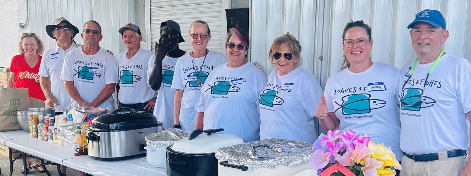The Loaves and Fishes serving line volunteers